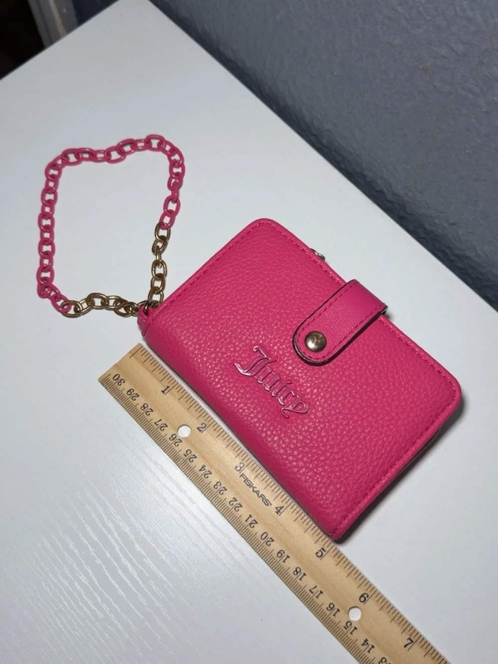 Juicy Couture compact leather